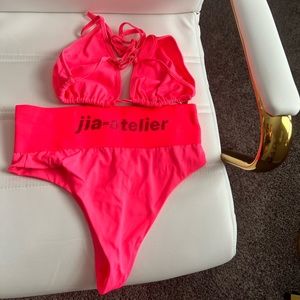 Swim suit customs Jia-Atelier medium used once neon pink